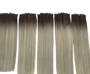 Sandy ash blonde root fade